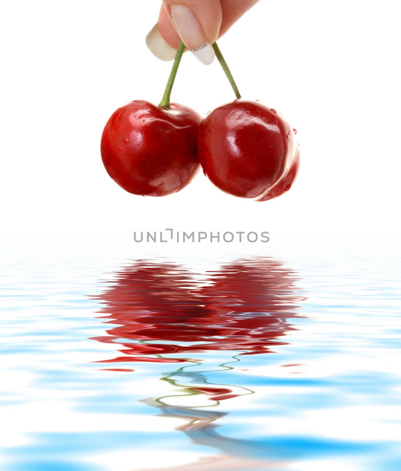 picture of wet cherry and water reflection