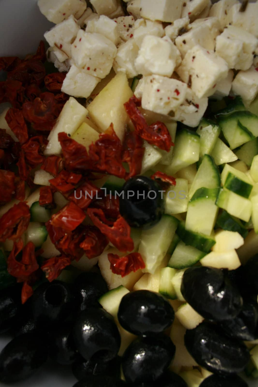 fruits and vegetables cut into a salad