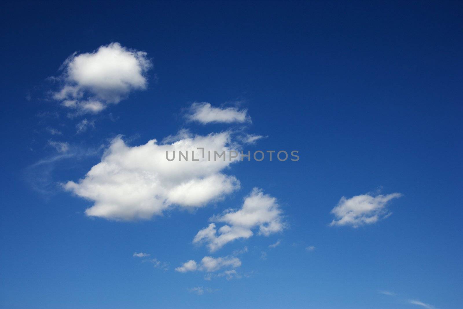 Peaceful clouds in blue sky.