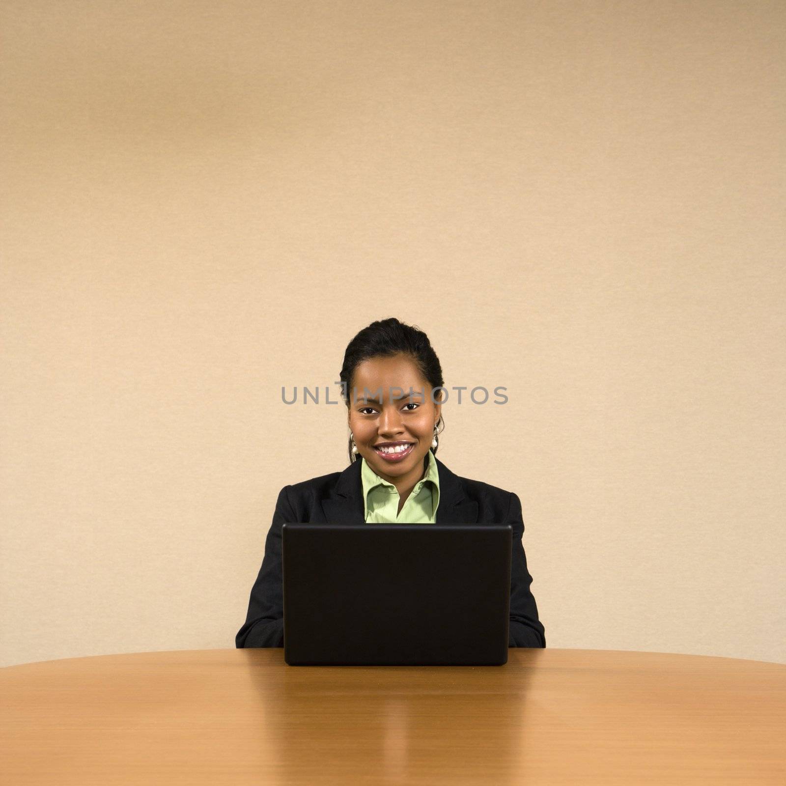 Businesswoman on computer. by iofoto