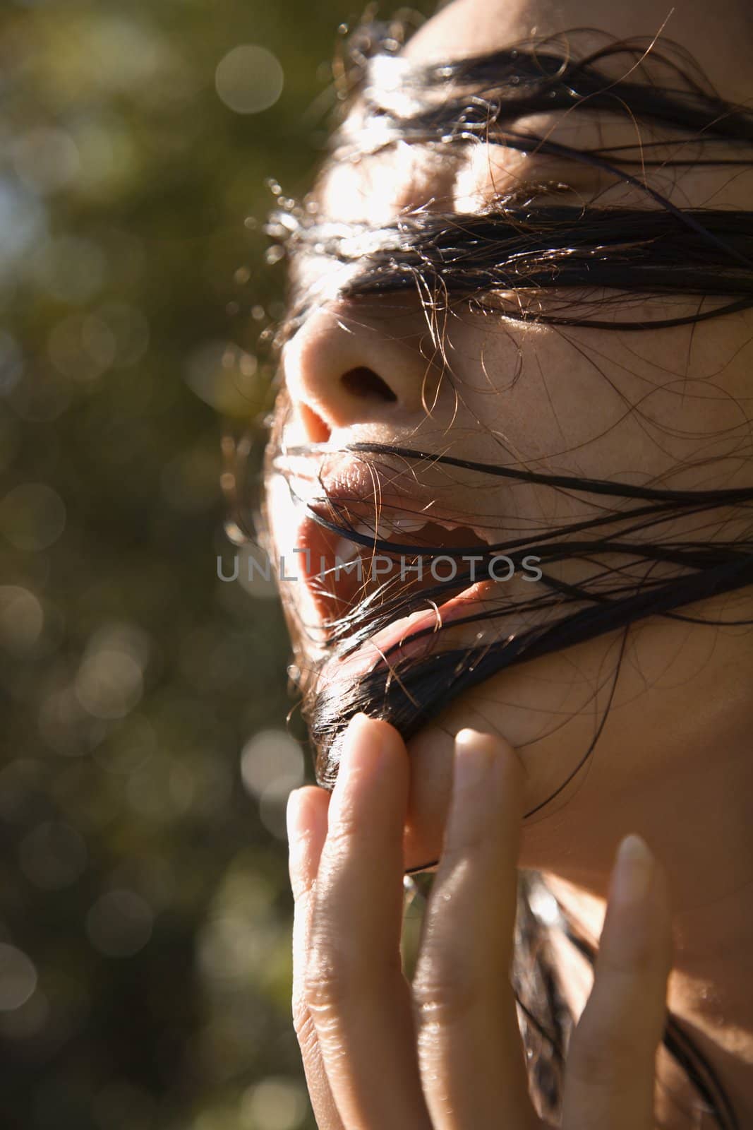 Woman with wet hair. by iofoto