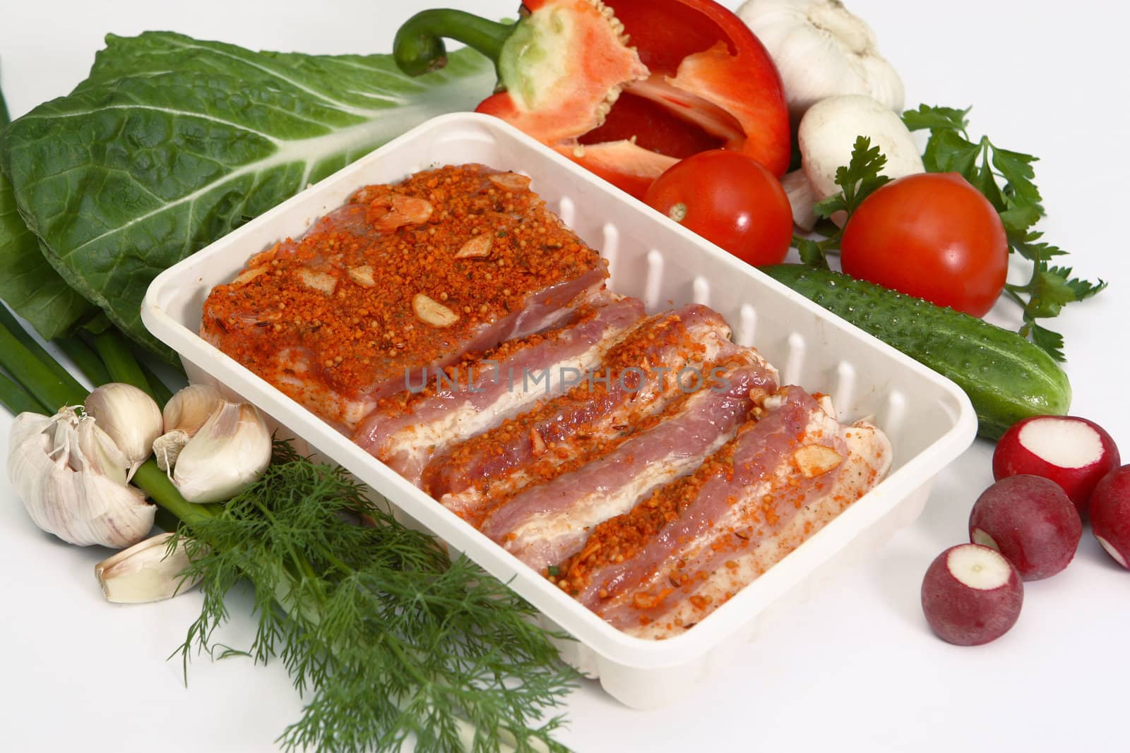 Crude meat, vegetables, greens and seasoning