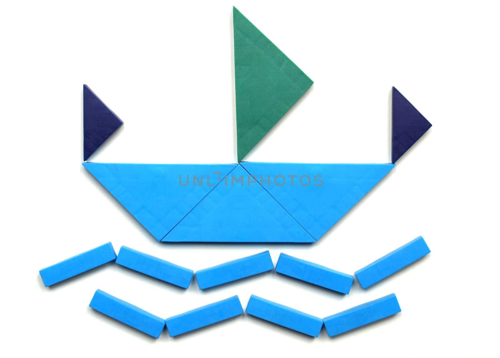 Tangram game toy with ship at sea