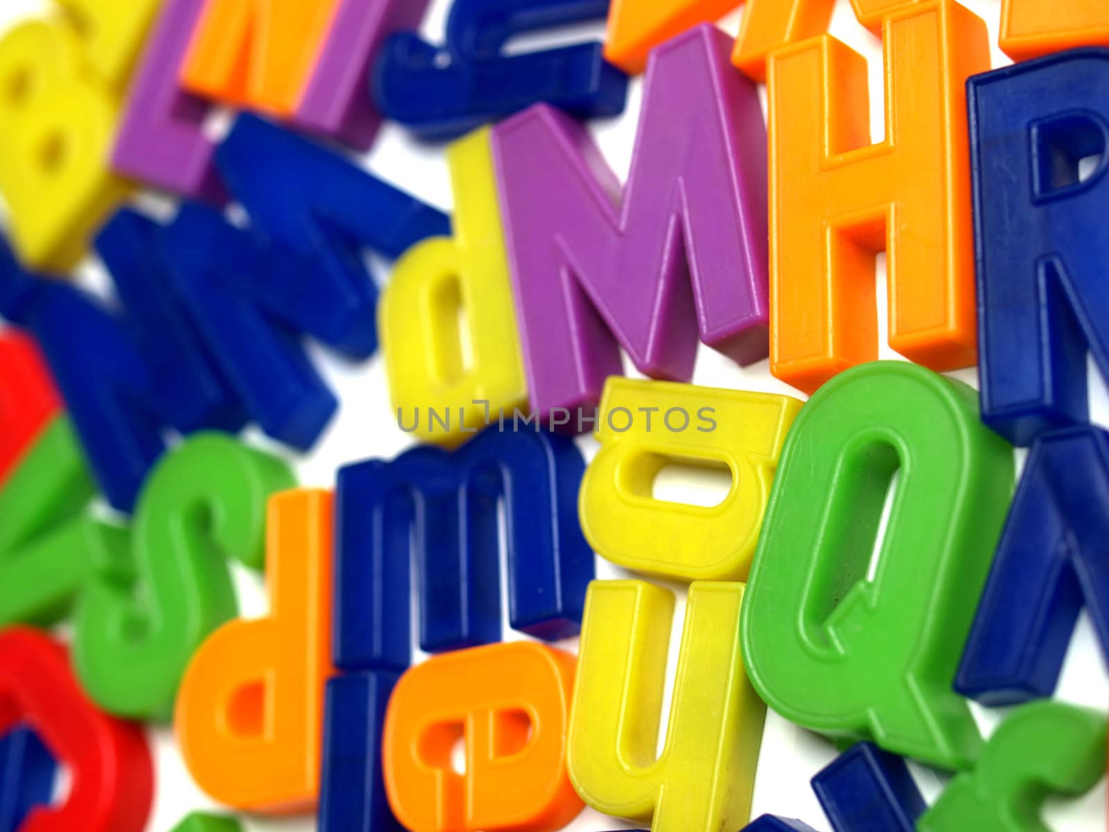 English alphabet letters in plastic toy characters