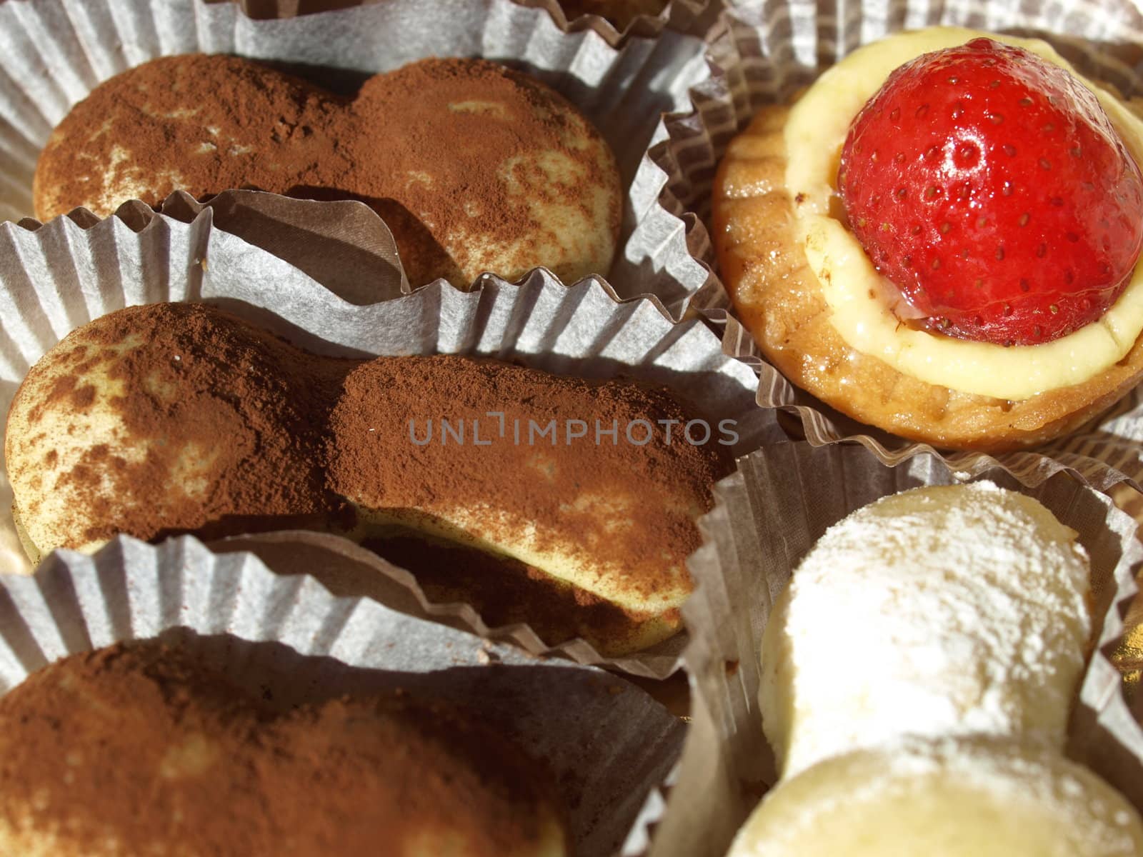 Mixed pastries with chocolate, cream, fruit