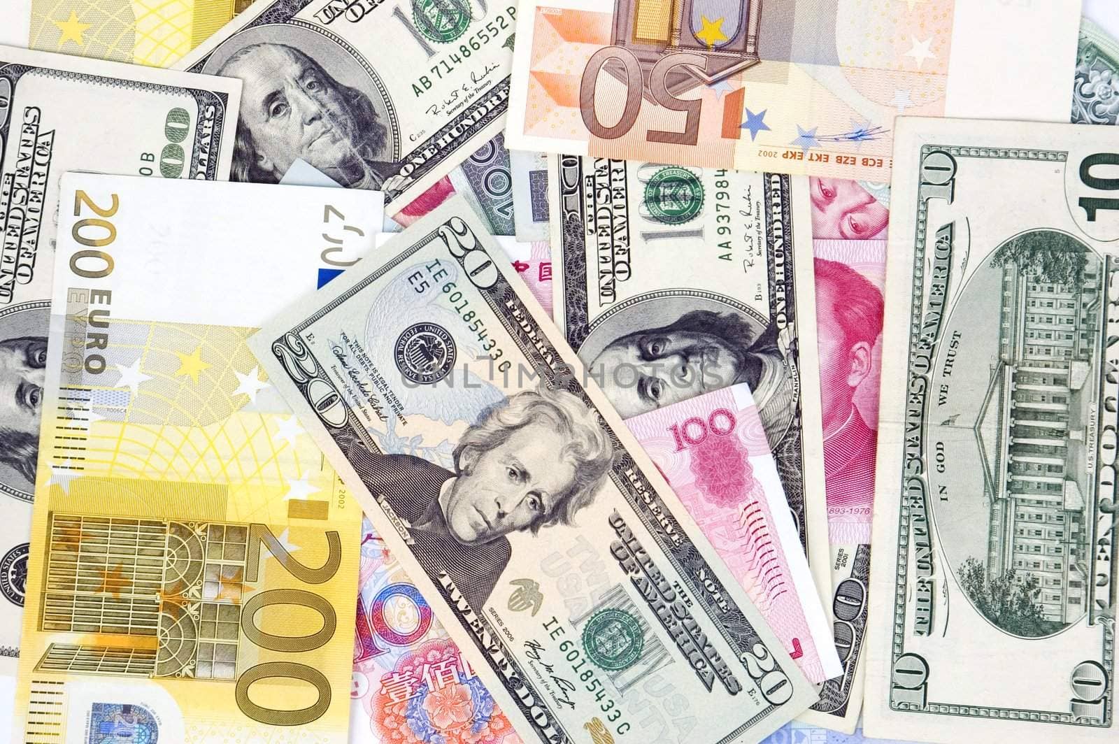 Photo of different banknotes, money in different shapes and colors. Useful for financial, economic backgrounds.