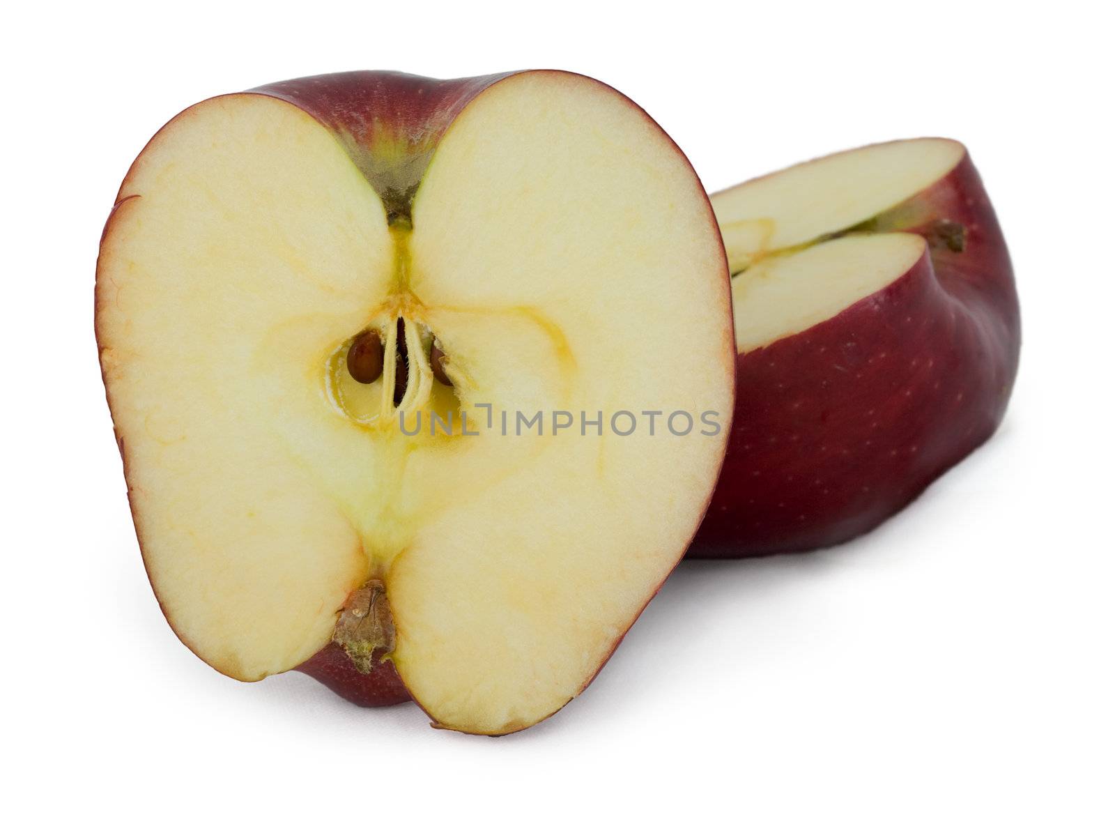 The cut apple on a white background