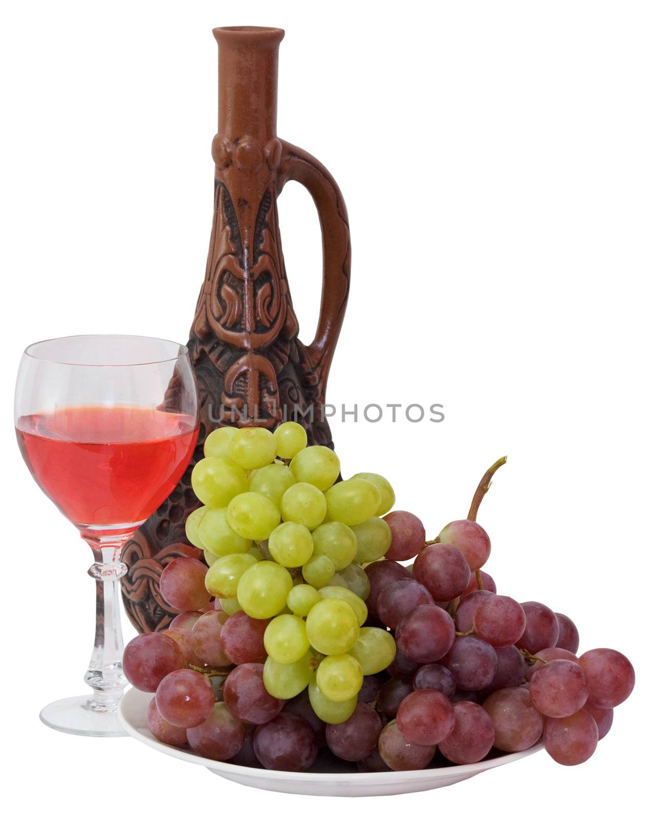 Bright still life with grapes and wine on white