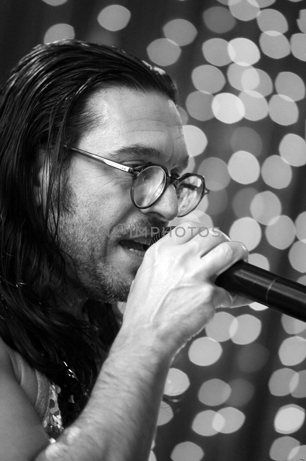 MOSCOW - DEC 25 : Russian singer and musician Oleg Sleptsov from the group "Semi-precious stones" during a show in Moscow in December 25, 2008. 