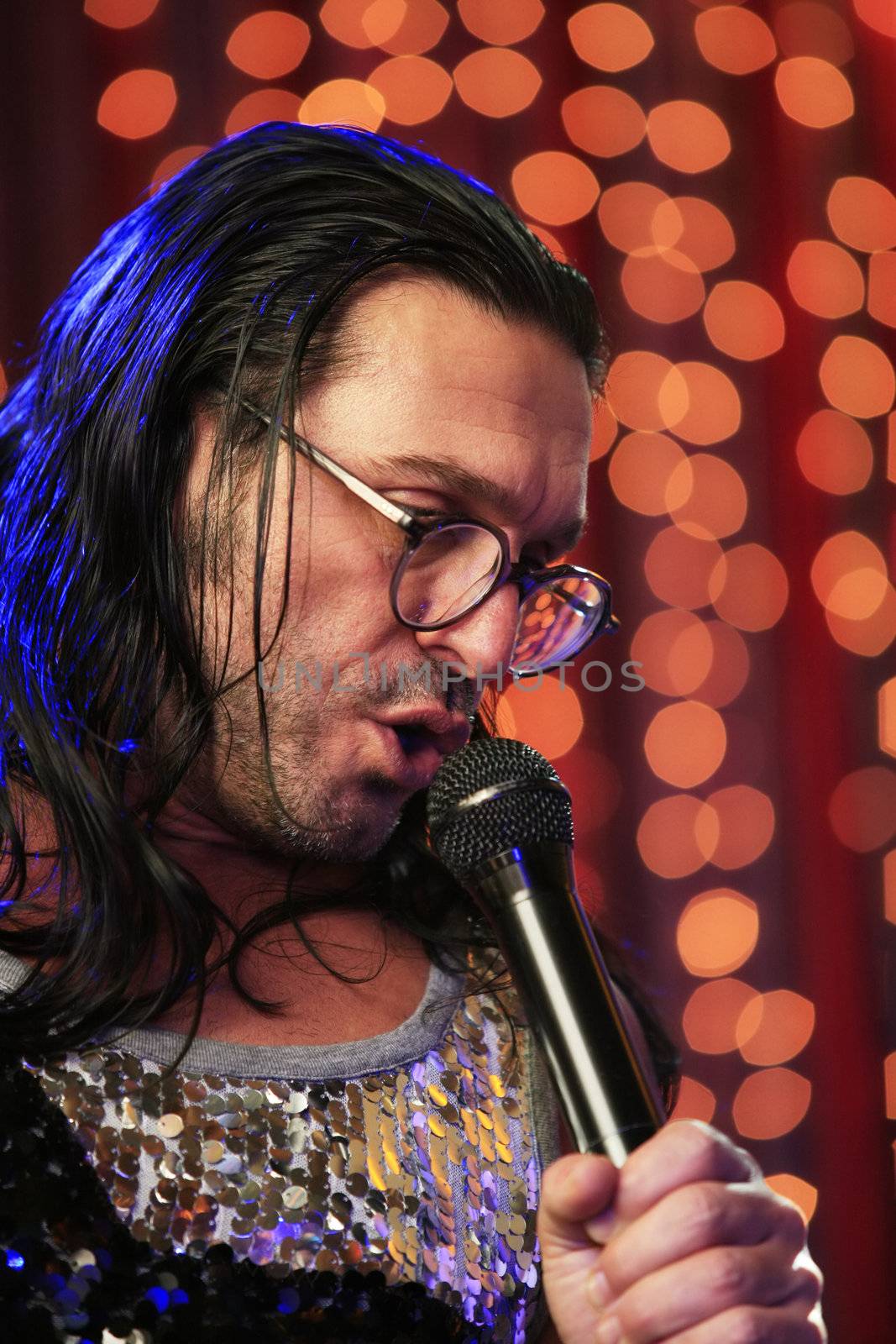 MOSCOW - DEC 25 : Russian singer and musician Oleg Sleptsov from the group "Semi-precious stones" during a show in Moscow in December 25, 2008. 