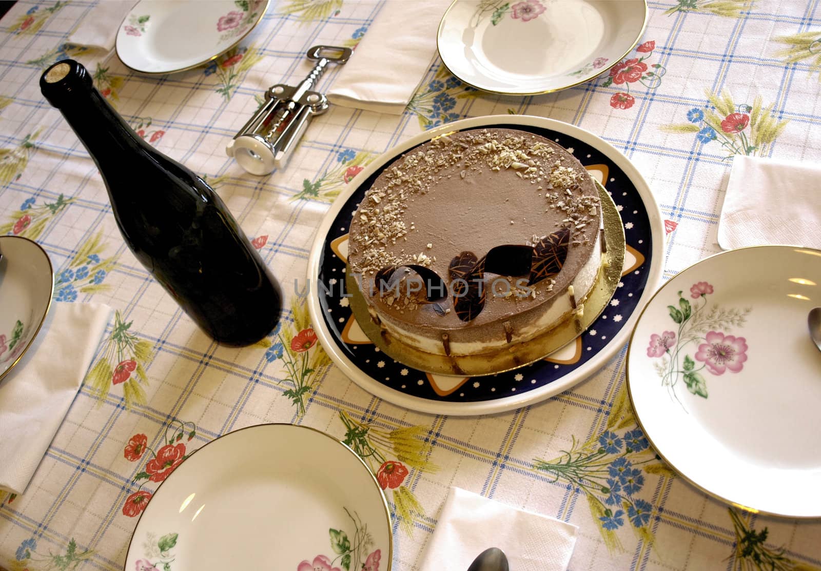 Table with cake and wine