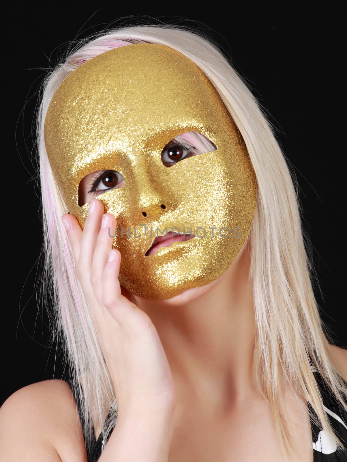 young blond girl with gold mask