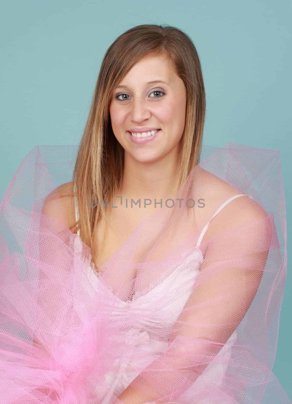 young caucasian woman, blue background