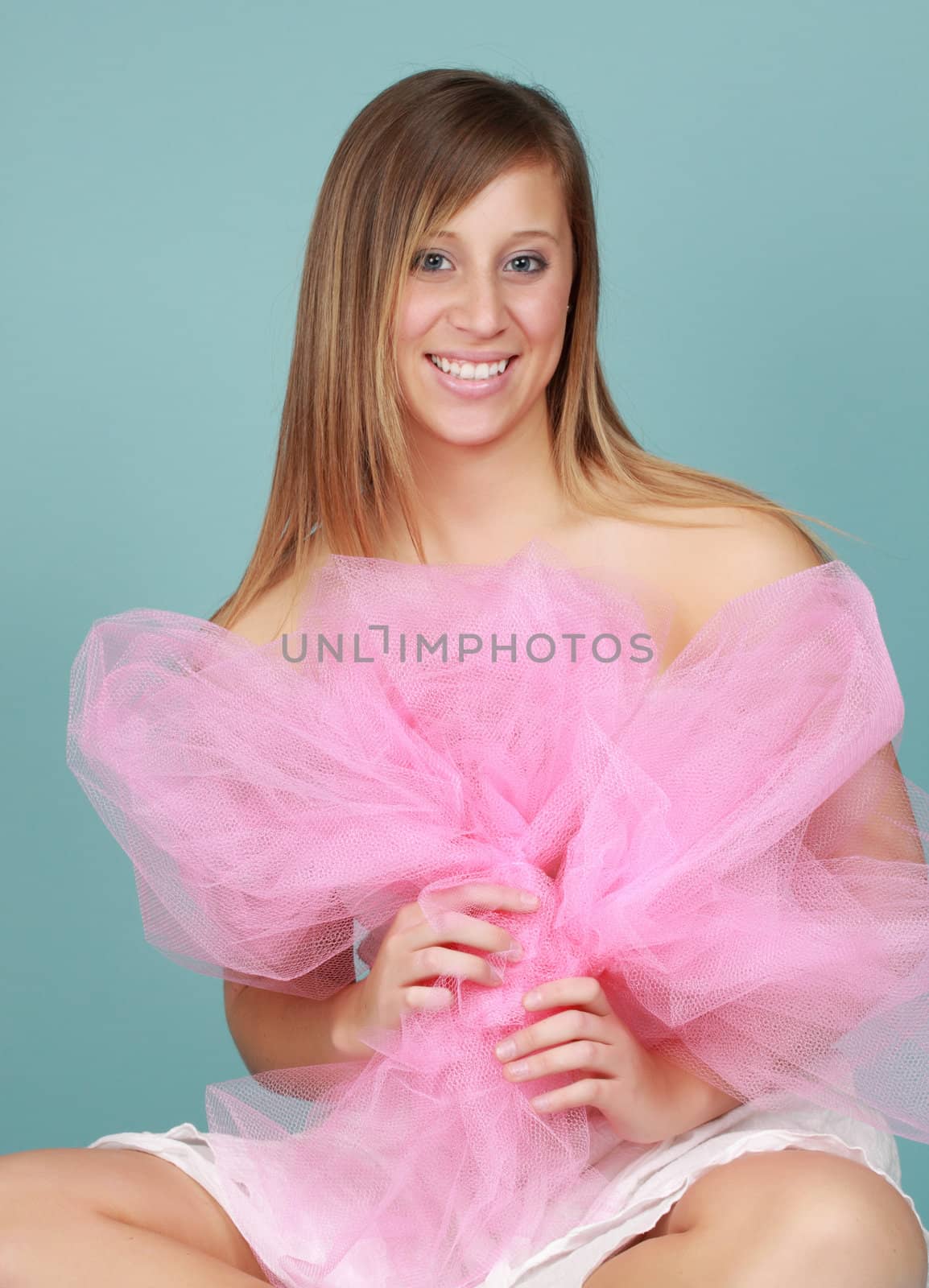 young caucasian woman, blue background