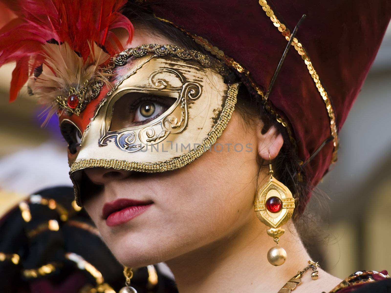 VALLETTA, MALTA - Feb 21st 2009 - Woman wearing beautiful Venetian style mask and costume at the International Carnival of Malta 2009