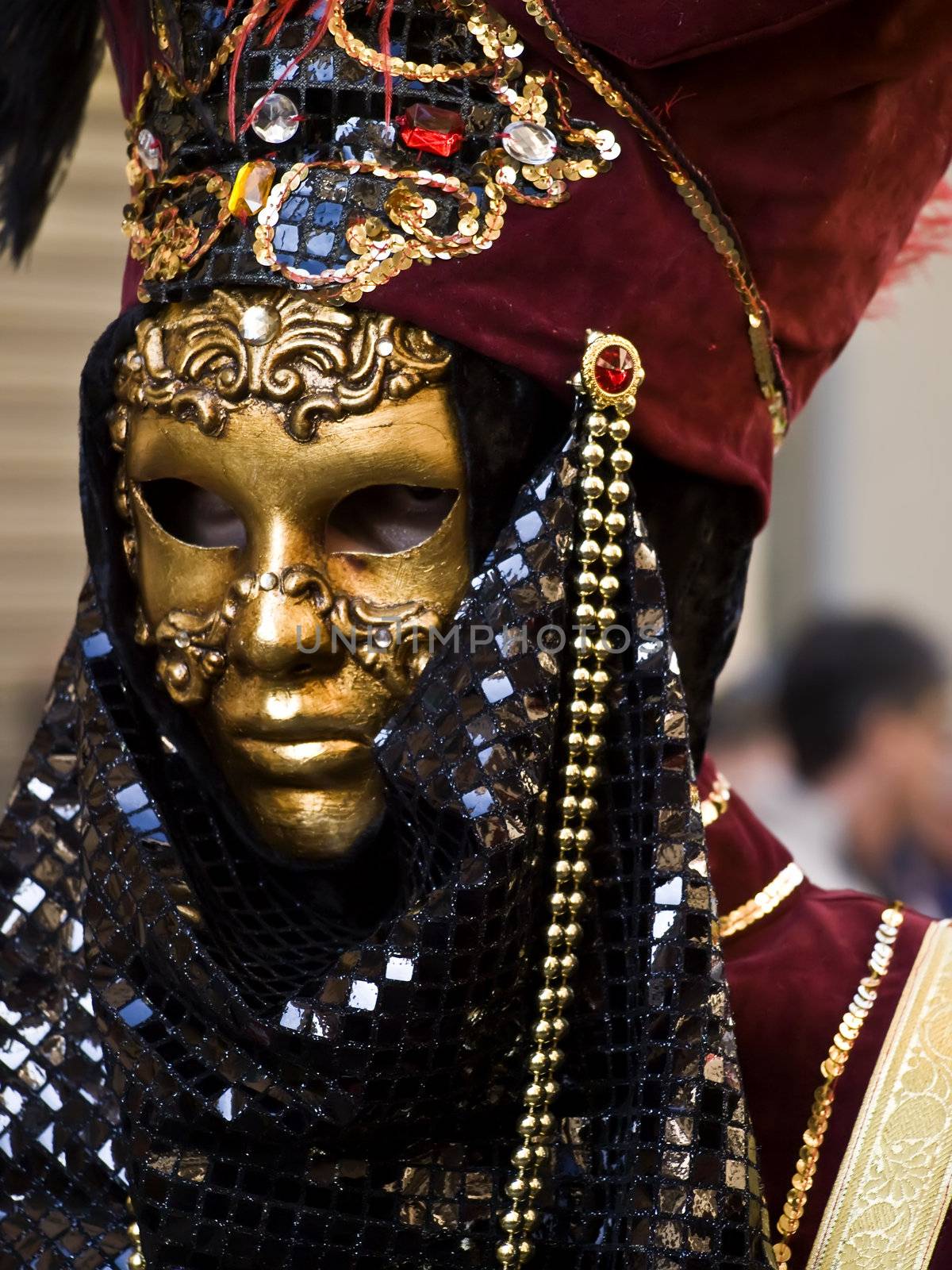 VALLETTA, MALTA - Feb 21st 2009 - Man wearing beautiful Venetian style mask and costume at the International Carnival of Malta 2009