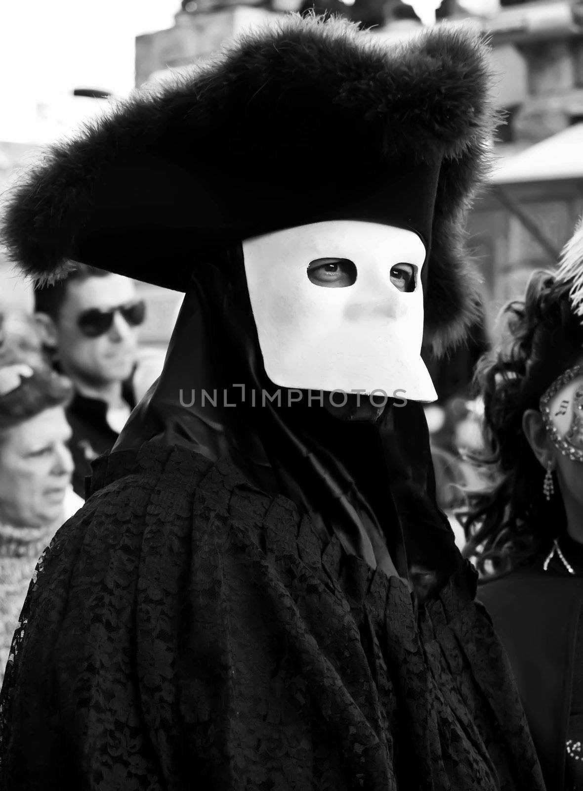 VALLETTA, MALTA - Feb 21st 2009 - Man wearing beautiful Venetian style mask and costume at the International Carnival of Malta 2009