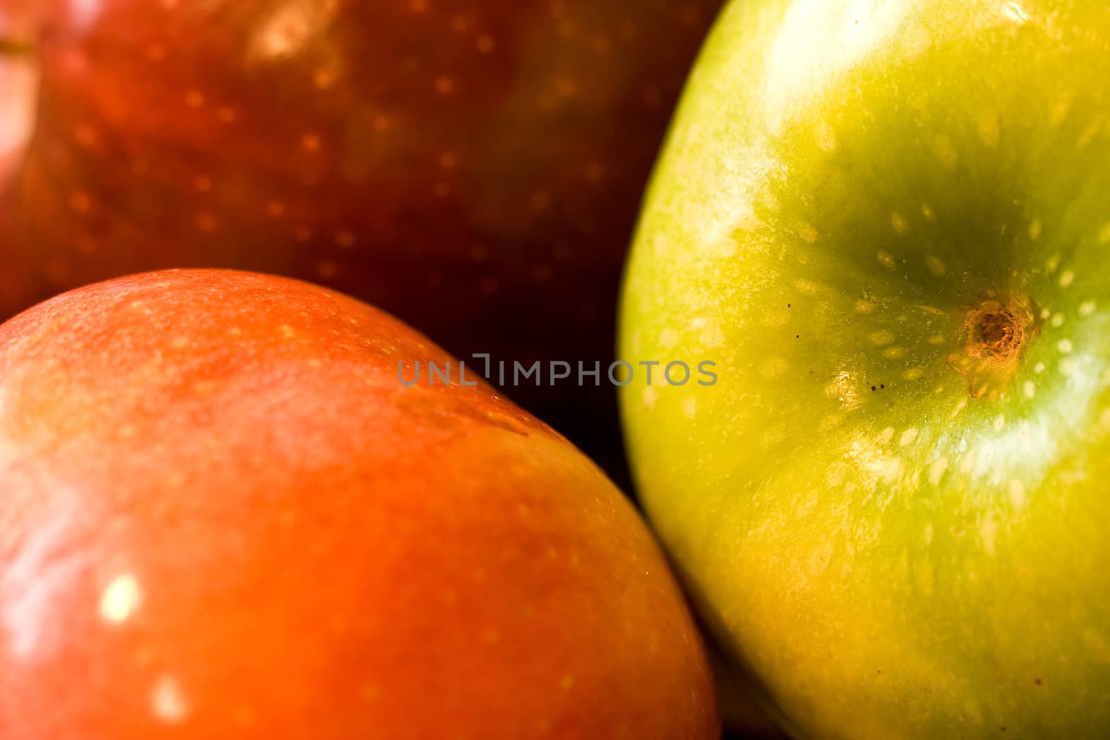 macro shot of fresh ripe apples washed with water