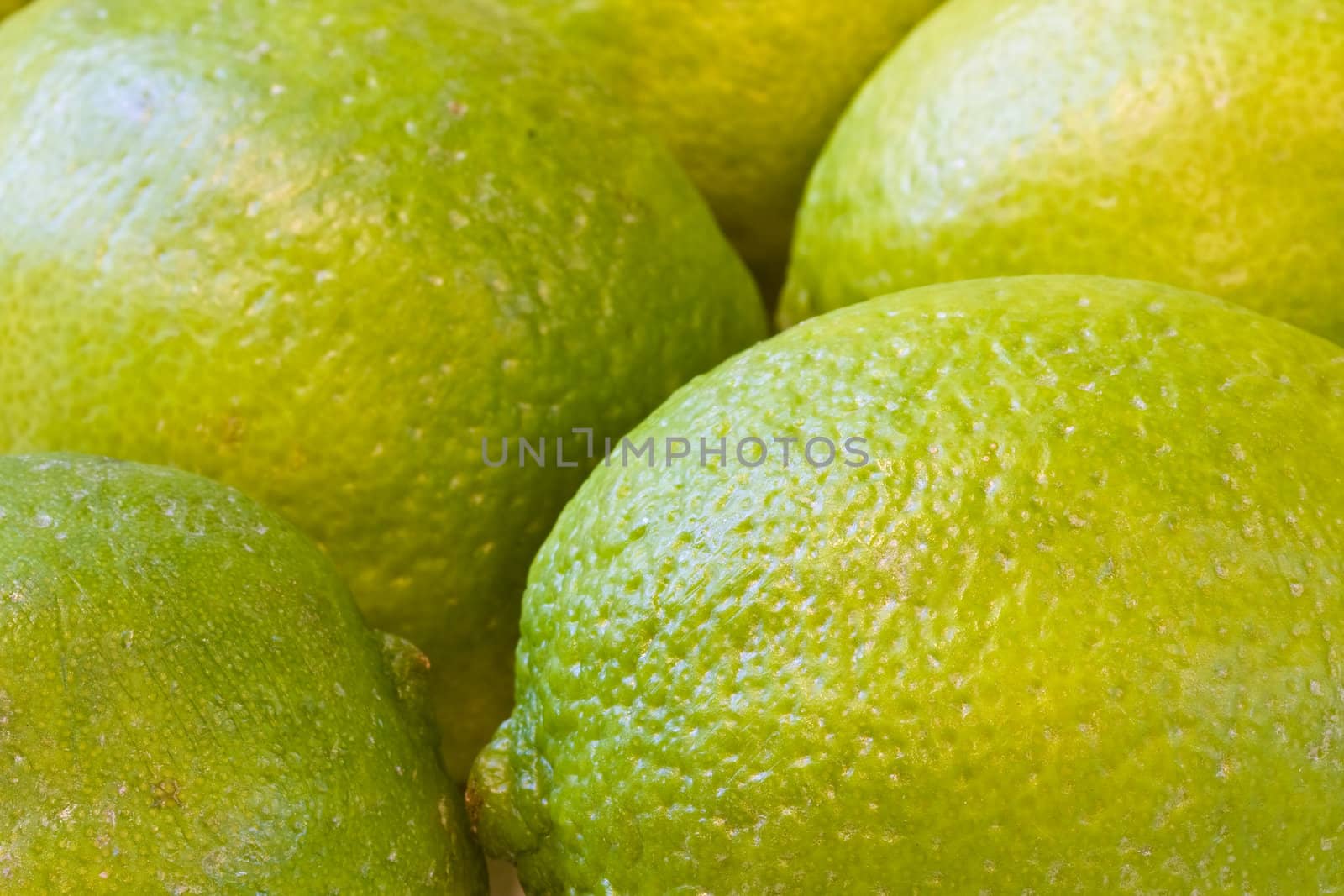 a bunch of limes shot close up