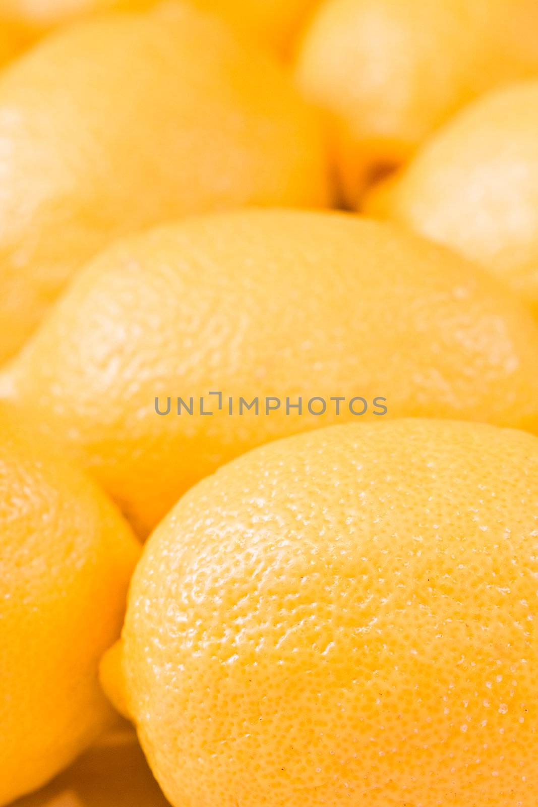 a bunch of lemons shot close up shallow depth of field