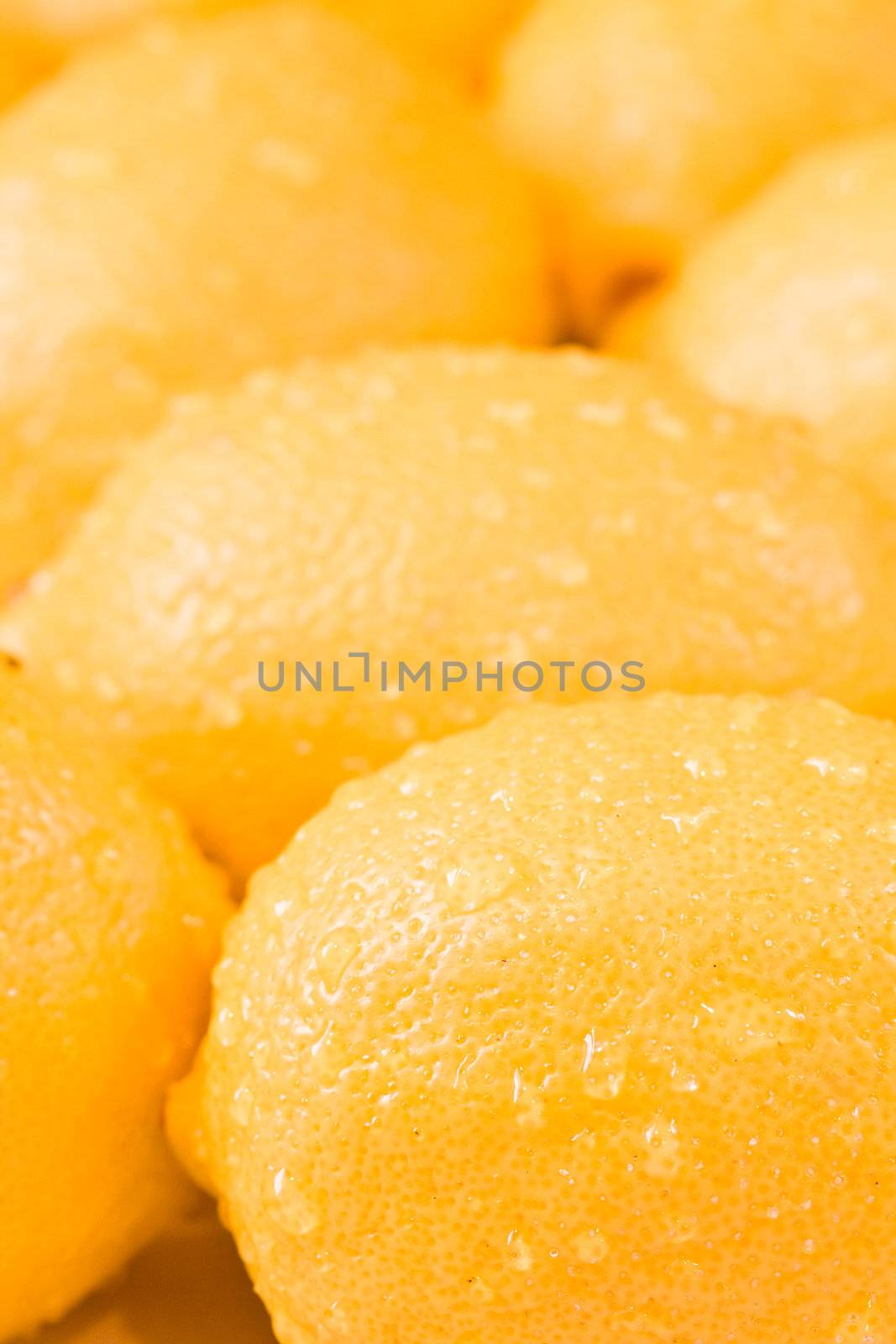 a bunch of lemons shot close up shallow depth of field