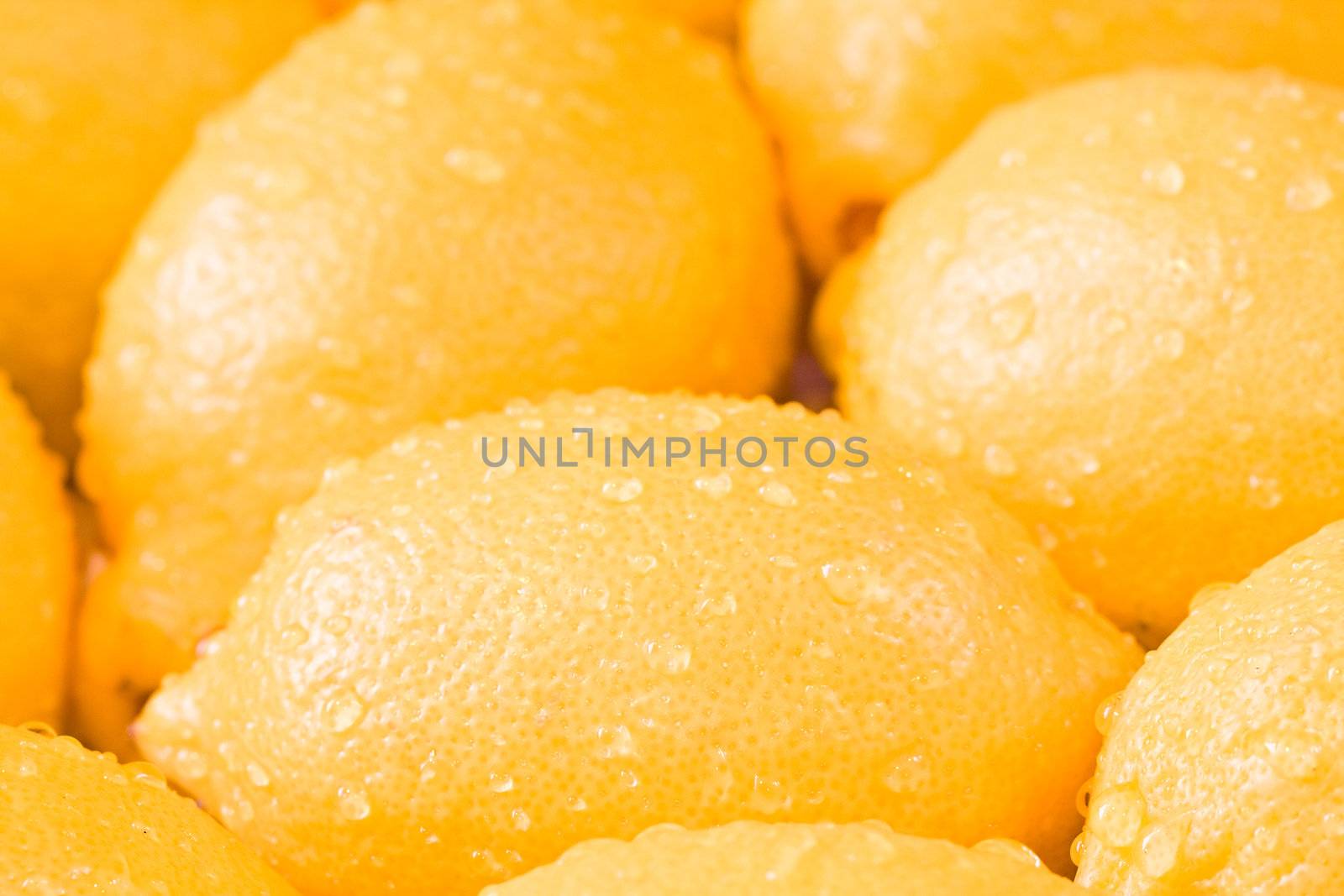 a bunch of lemons shot close up shallow depth of field
