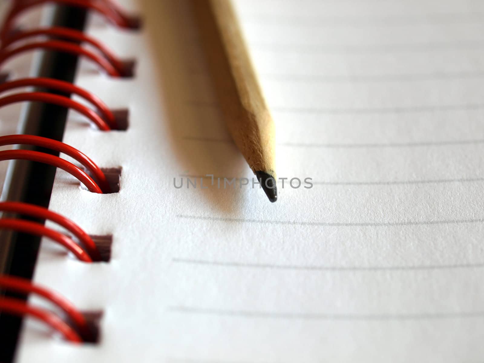 Notebook note pad page with pencil