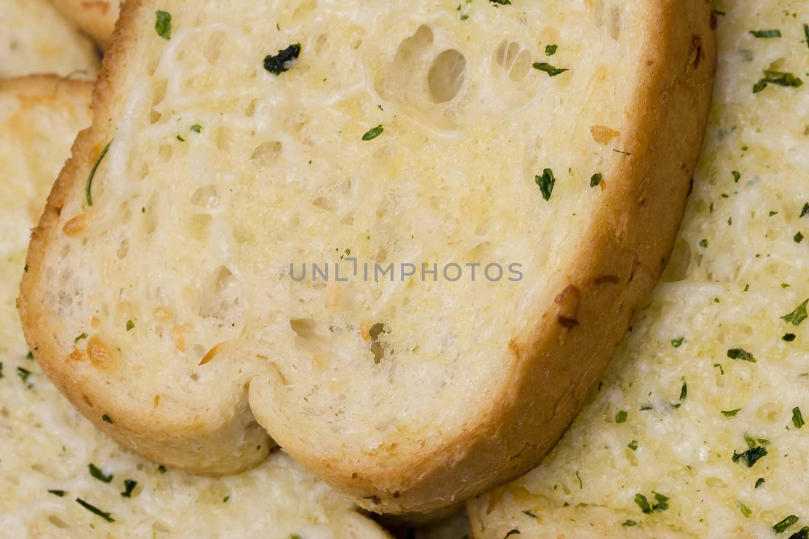 macro shot of fresh hot garlic toast nice color