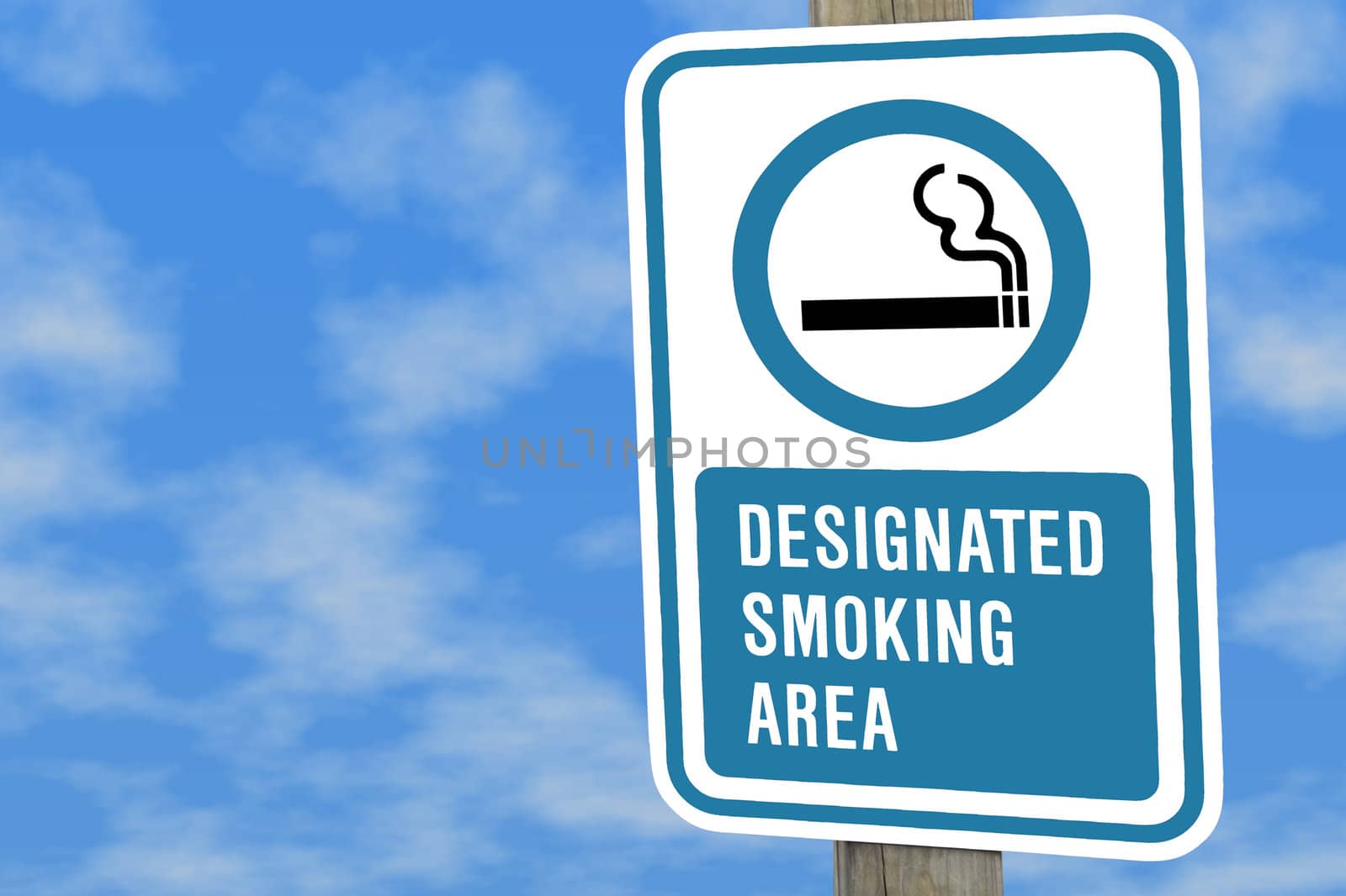 Designated smoking sign on a post against a blue sky with puffy white clouds