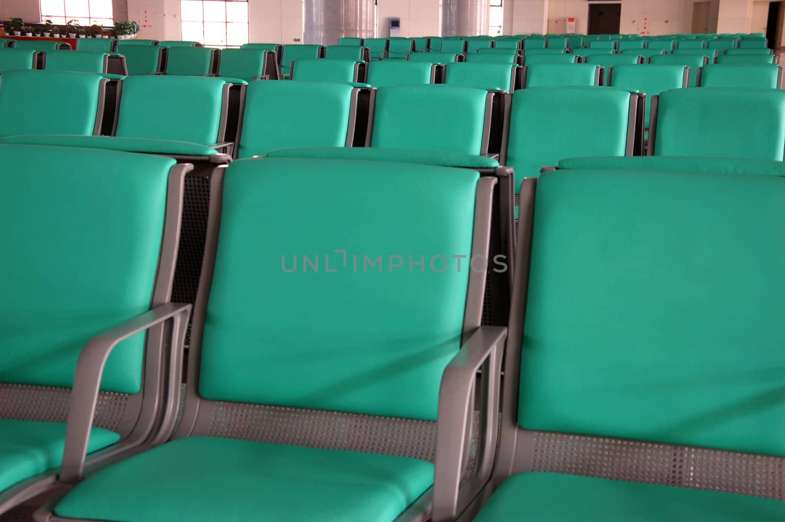 Group of seats in waiting room. Train station hall in Guangzhou, China.
