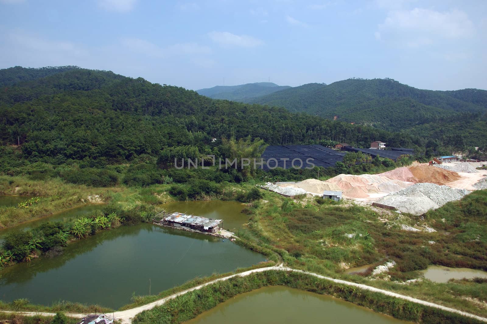 Green, natural landscape with lakes and rivers in Chinese countryside, around town QingYuan in Guangdong province.
