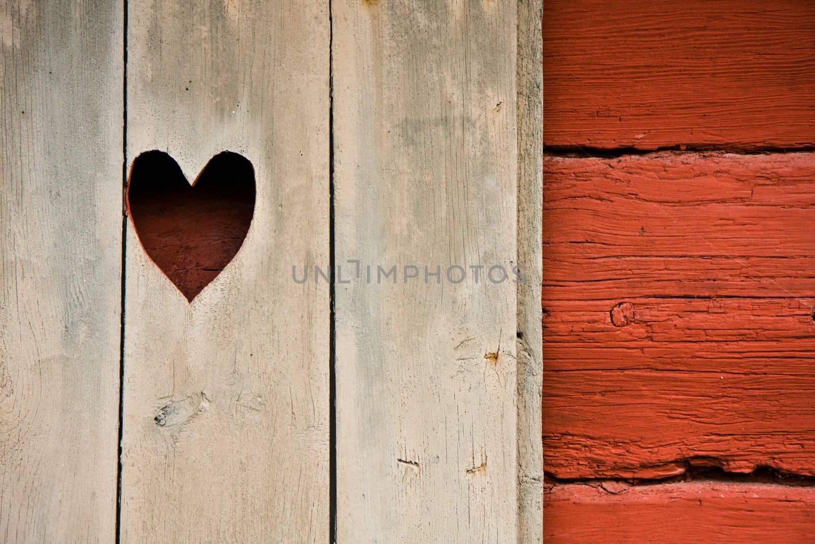 Heart symbol in a cottage's shutter