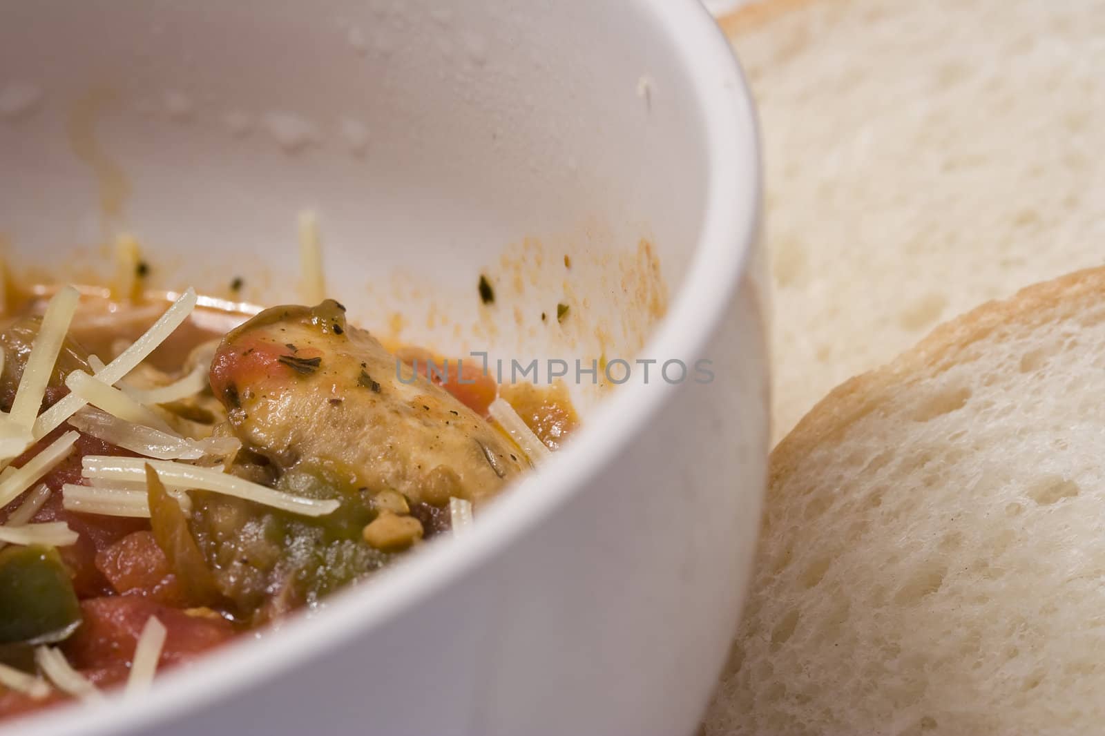 serving of penne spaghetti white dishes nice reddish colors