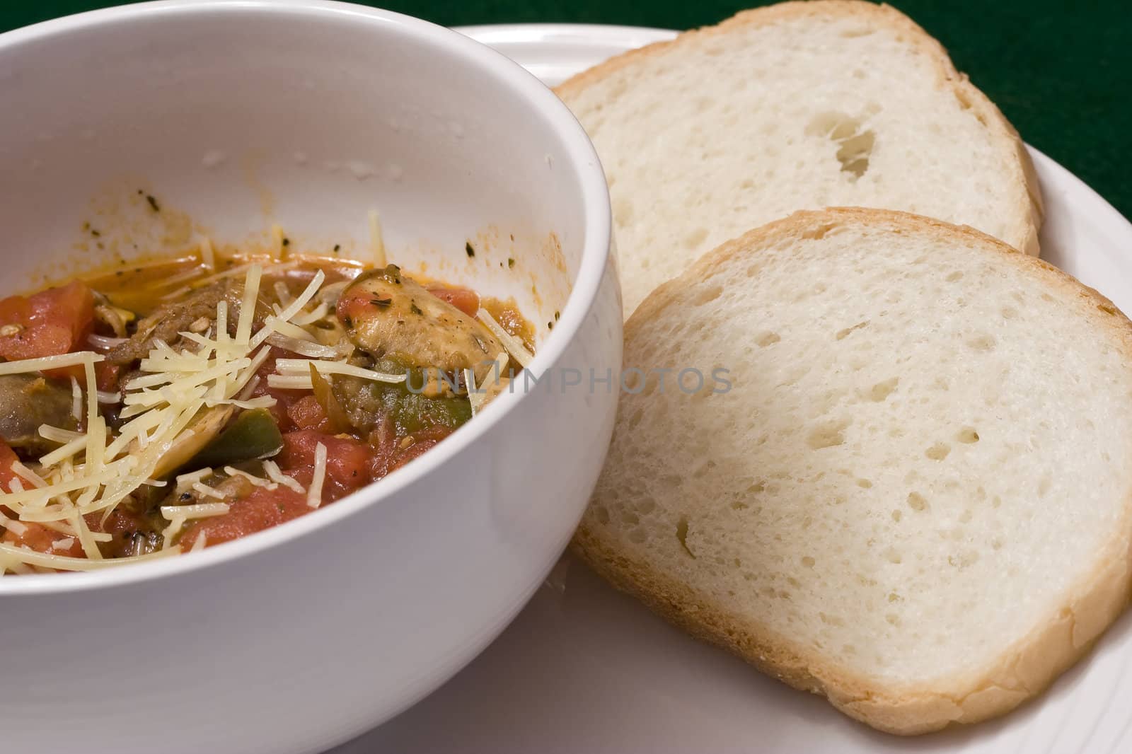 serving of penne spaghetti white dishes nice reddish colors