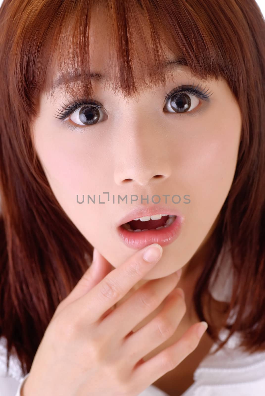 Expression of surprise, closeup portrait of Asian businesswoman face.
