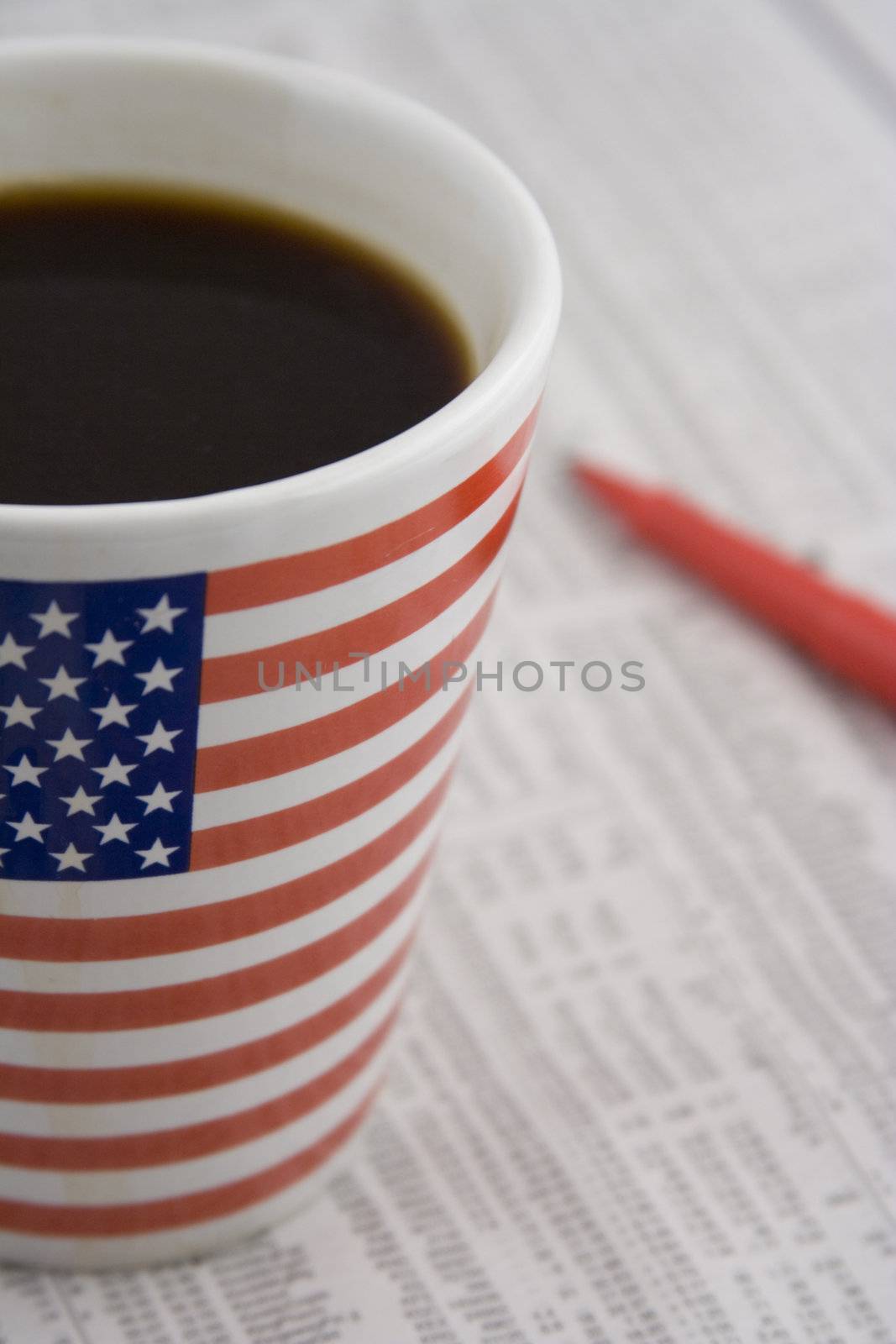 macro of coffee cup on paper