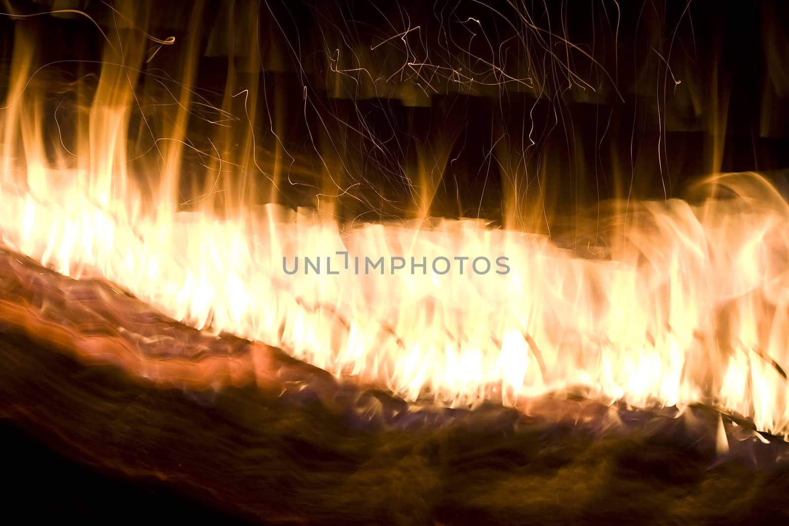 Long exposure fire background streaking across the screen