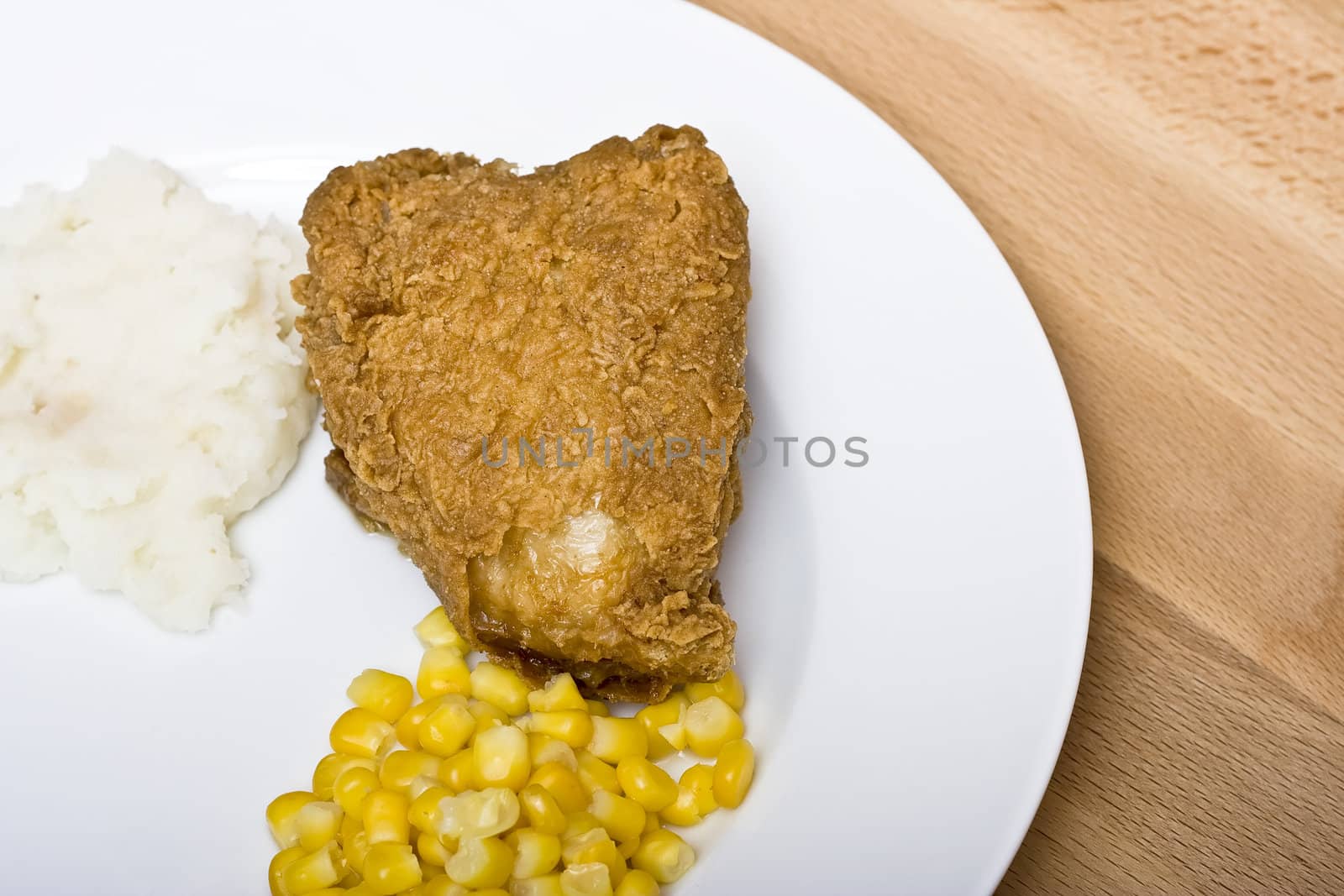 crispy golden chicken mashed potatoes and corn ready to eat
