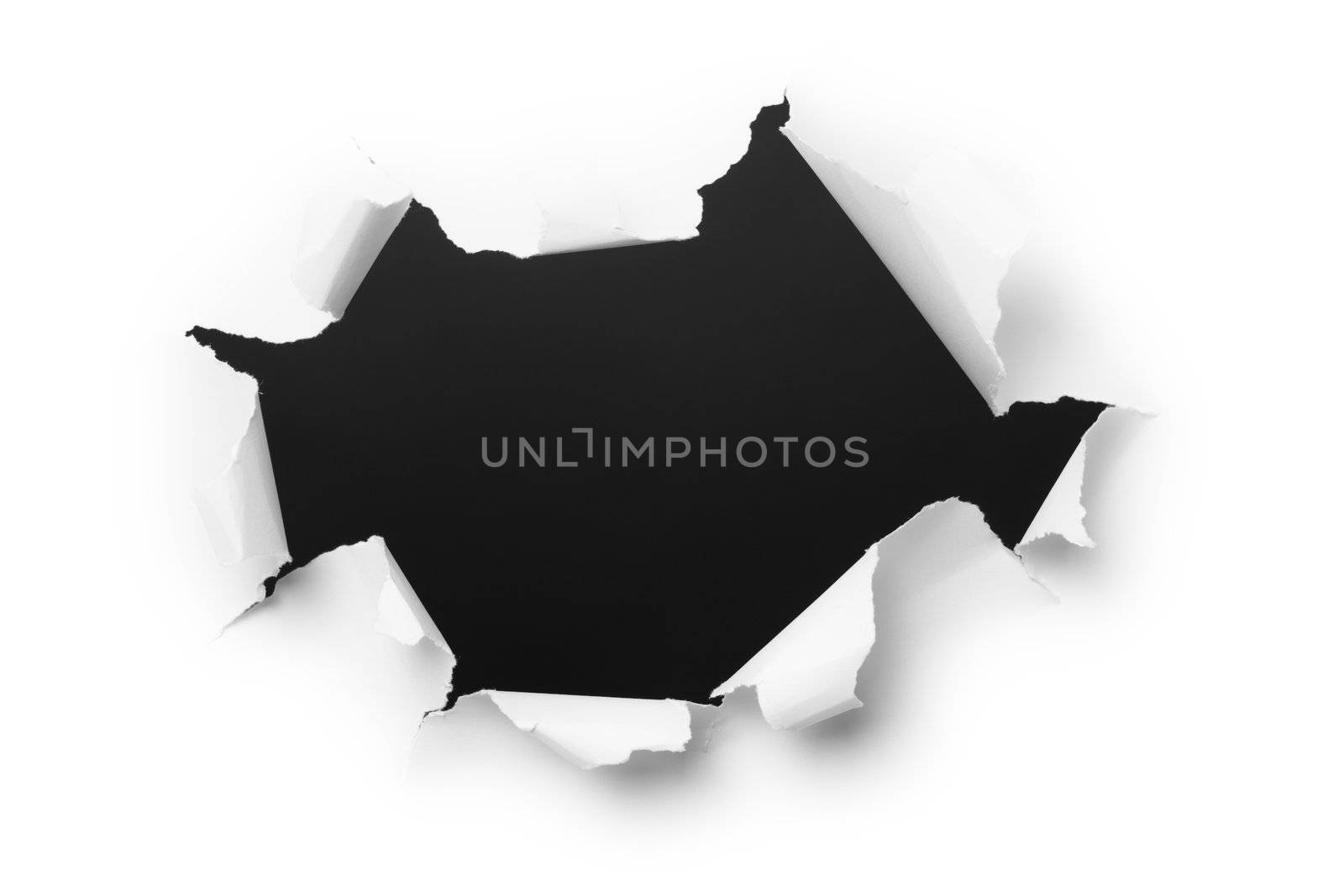 Big, dark hole in the white paper