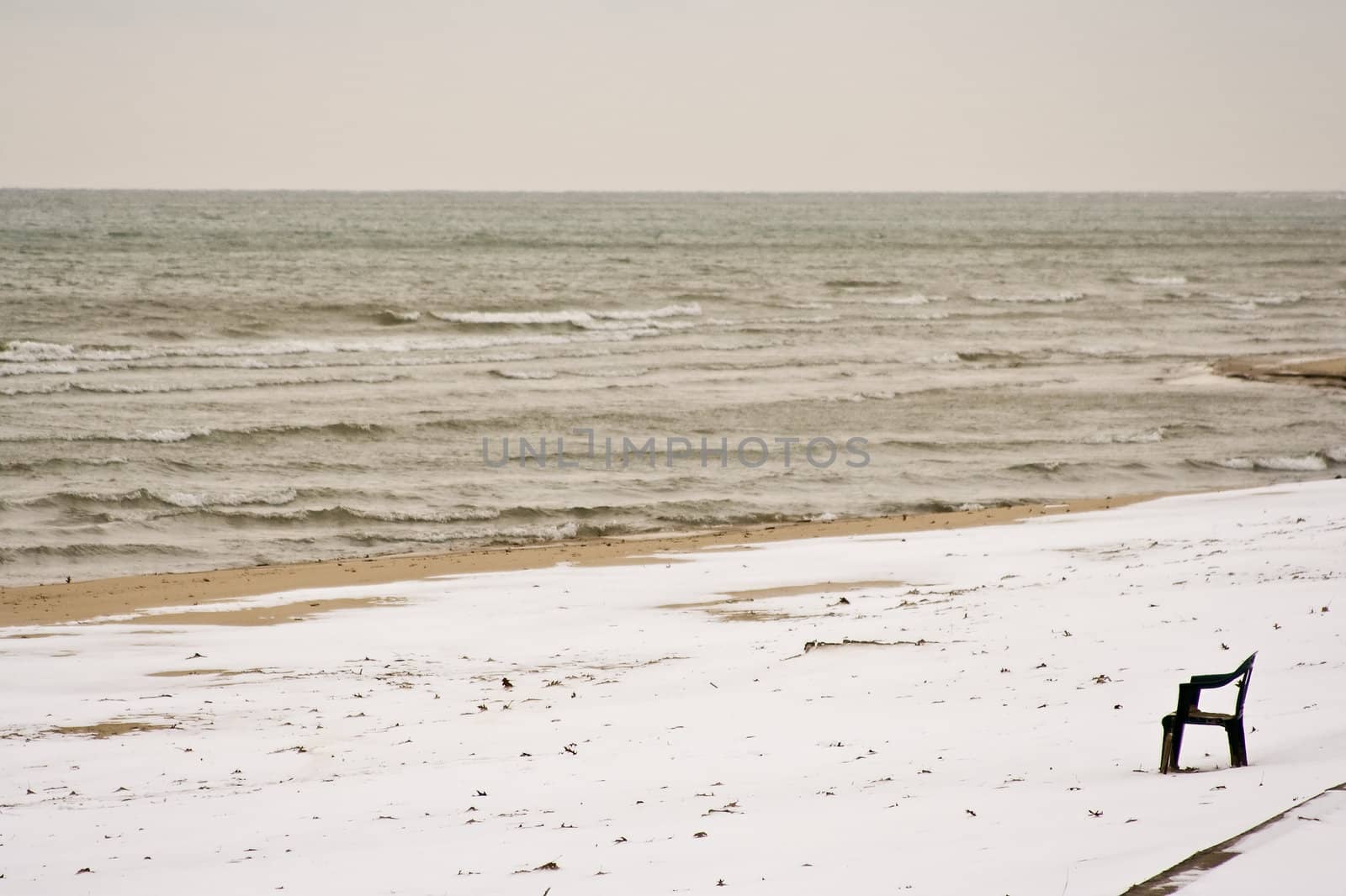 I brought my chair to the beach but it's just too cold to swim hurry up summer