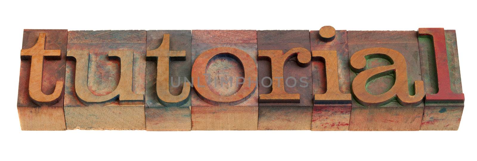 tutorial - word in vintage wooden letterpress printing blocks isolated on white
