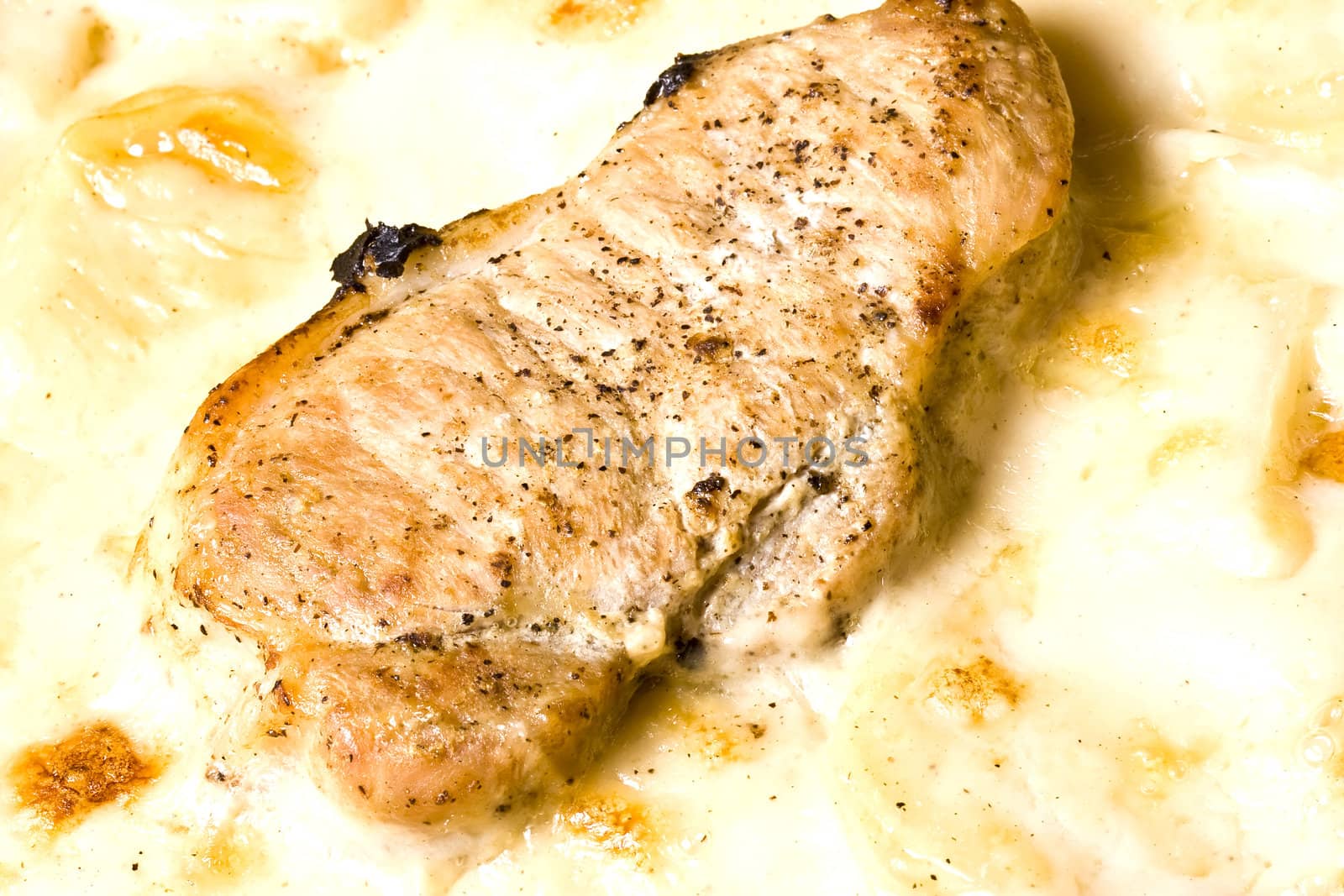 creamy scalloped potatoes and pork chop bake 