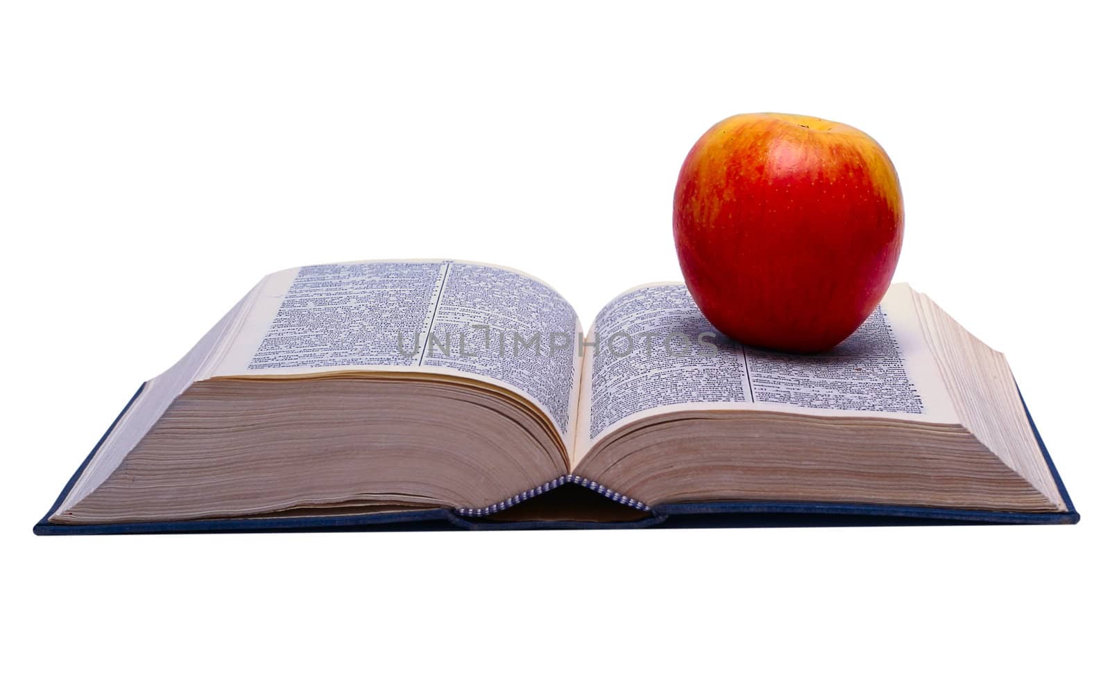 The concept of learning. Apple and the open book. Carefully isolated on a white background.