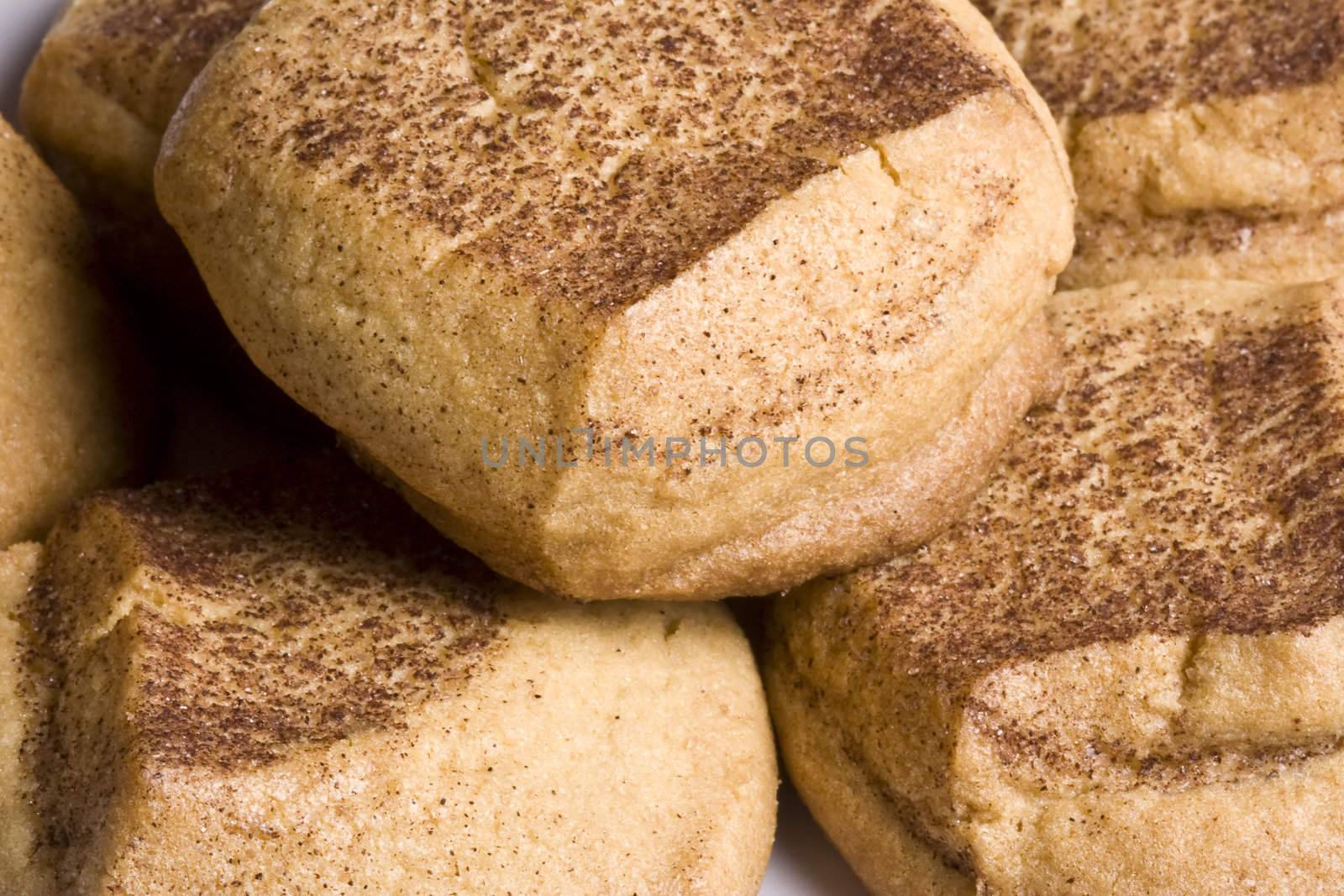 close up of some very delicious snickerdoodle sugar cookies just out of the warm oven.