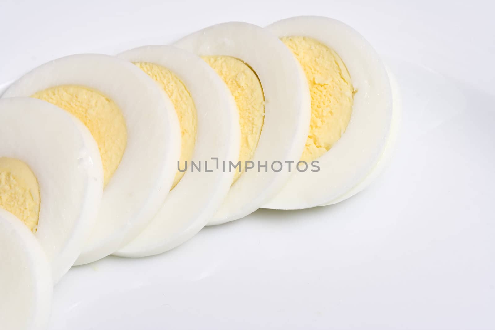 hard boiled eggs sliced ready to top a great salad