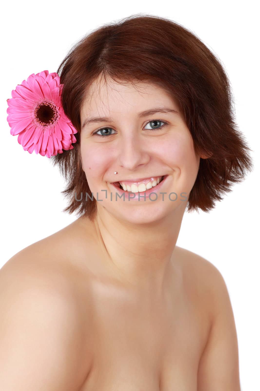 girl with pink gerber on hair, white background