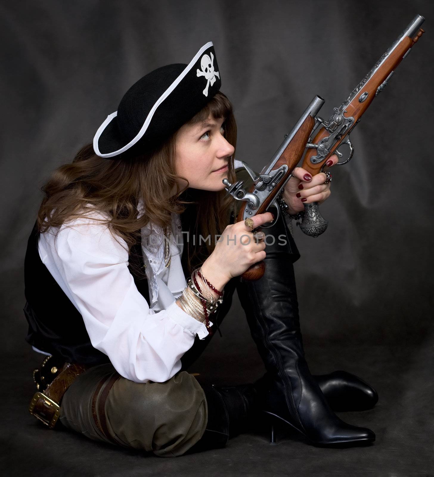 Girl - pirate on black with two pistols in hands