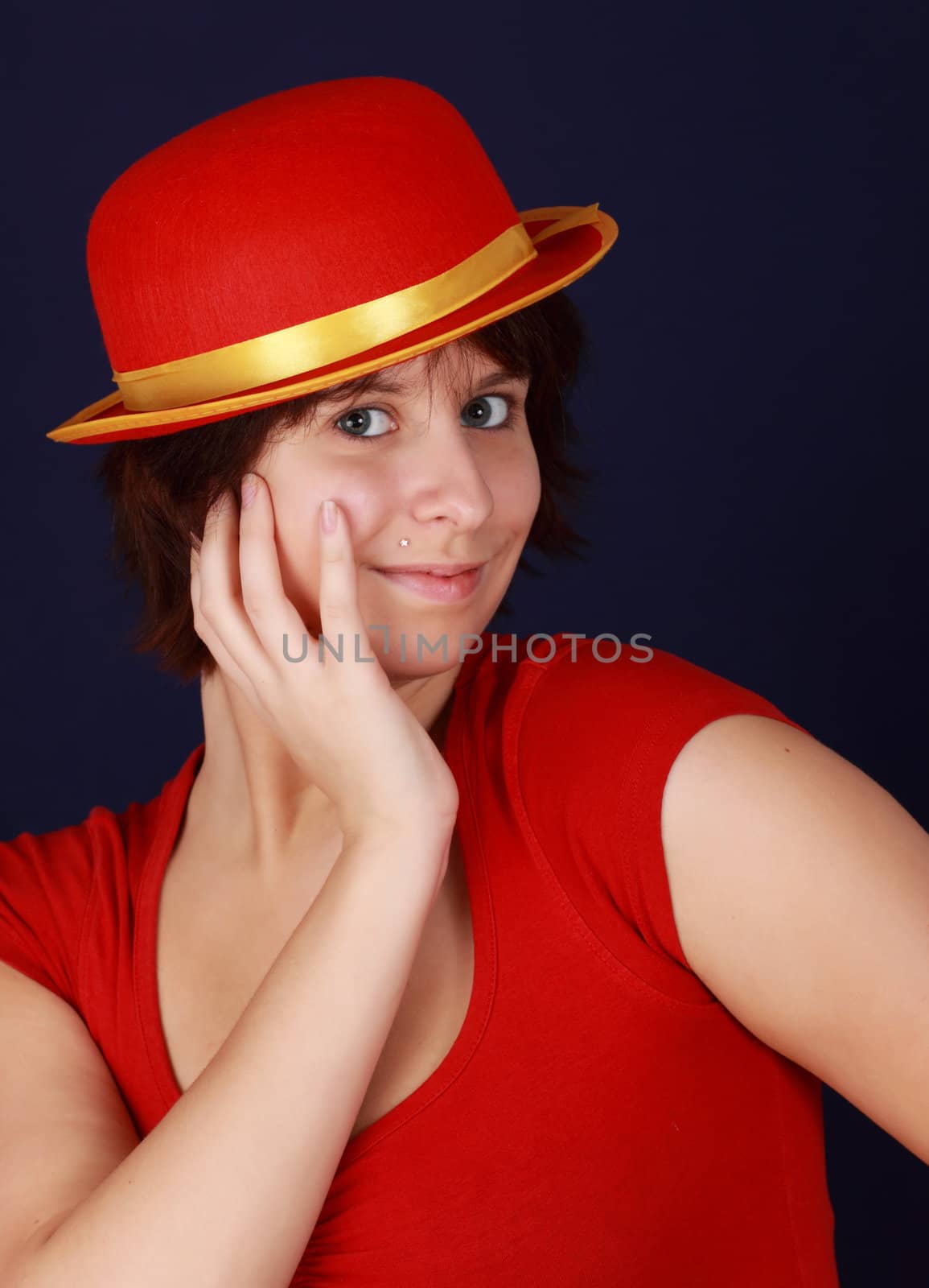closeup portrait of young woman with red hat