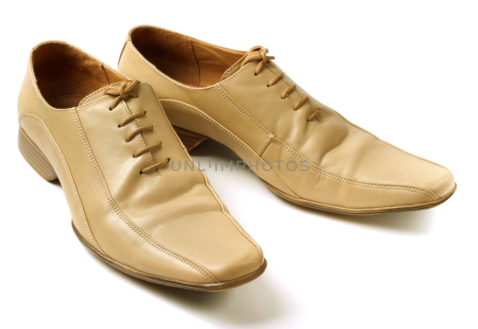 Mans beige shoes. Isolated on a white background