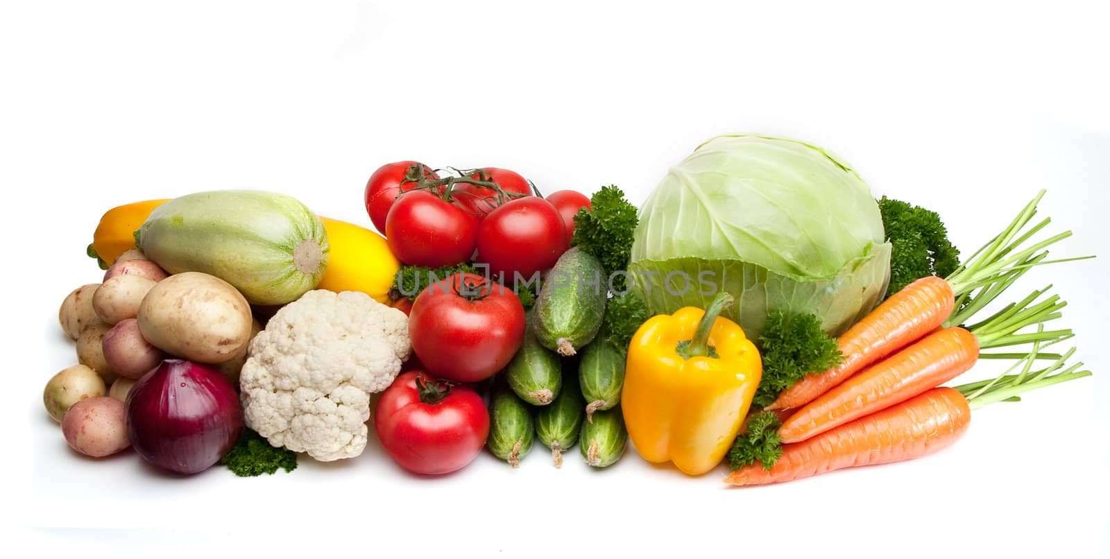 Group of vegetables: cabbage, parsley, carrots, tomatoes, cucumbers, potatoes, onions and squash. Isolated on a white background, light shade.